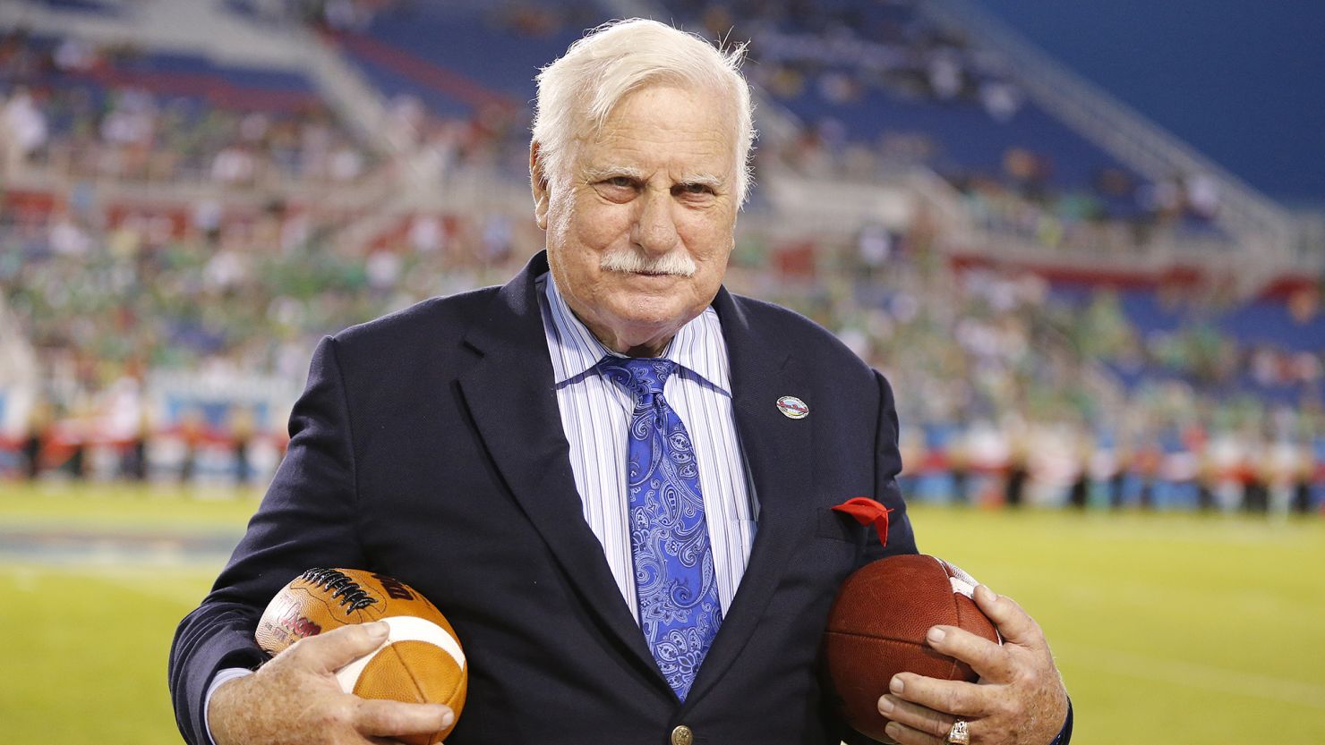 Howard Schnellenberger holds the game balls prior to the start of the Boca Raton Bowl between Marshall and Northern Illinois at FAU Stadium in Boca Raton, Florida, on Dec. 23, 2014.