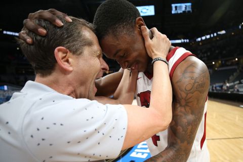 Arkansas head coach Eric Musselman celebrates with Davonte Davis after their Sweet Sixteen victory over Oral Roberts. Davis hit the game-winning shot in the 72-70 victory.