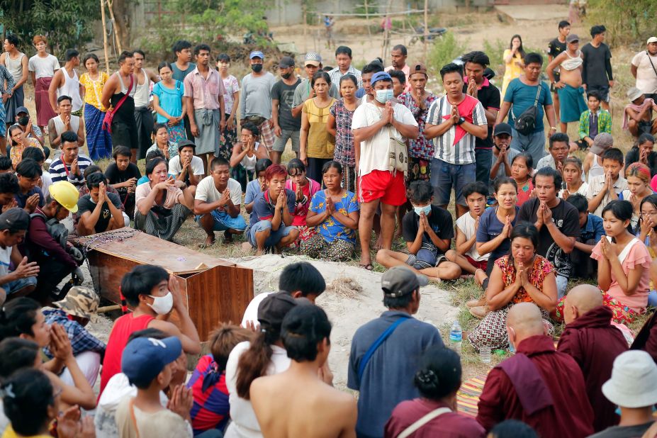 Mourners attend the funeral of Tin Hla, a 43-year-old who was reportedly shot dead by security forces during a protest.