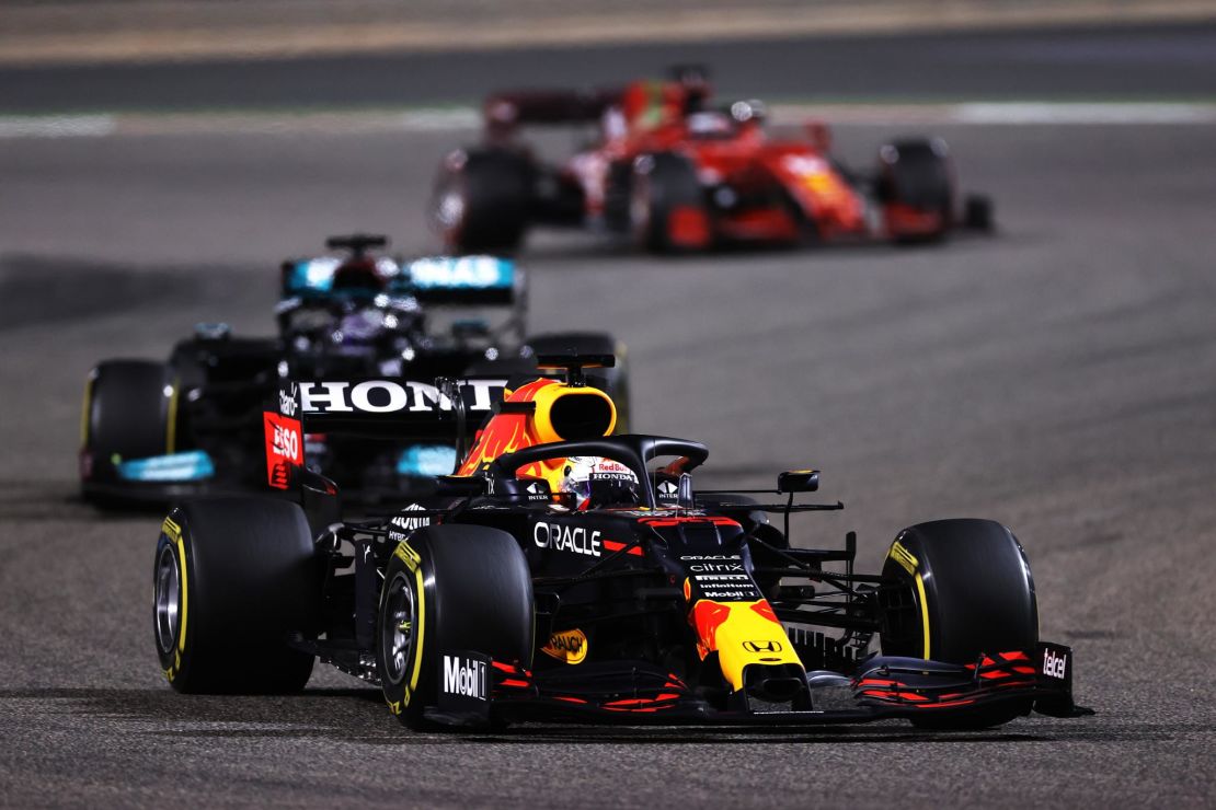 Max Verstappen driving the (33) Red Bull Racing RB16B Honda leads Lewis Hamilton during the F1 Grand Prix of Bahrain at Bahrain International Circuit on March 28, 2021.
