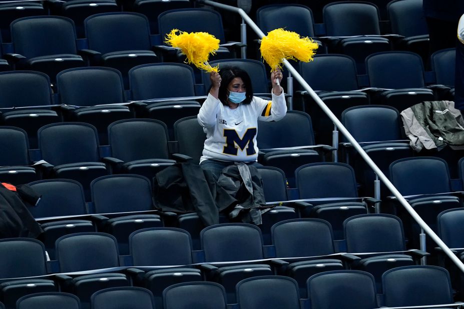 A Michigan fan cheers on her team during the game against Florida State.