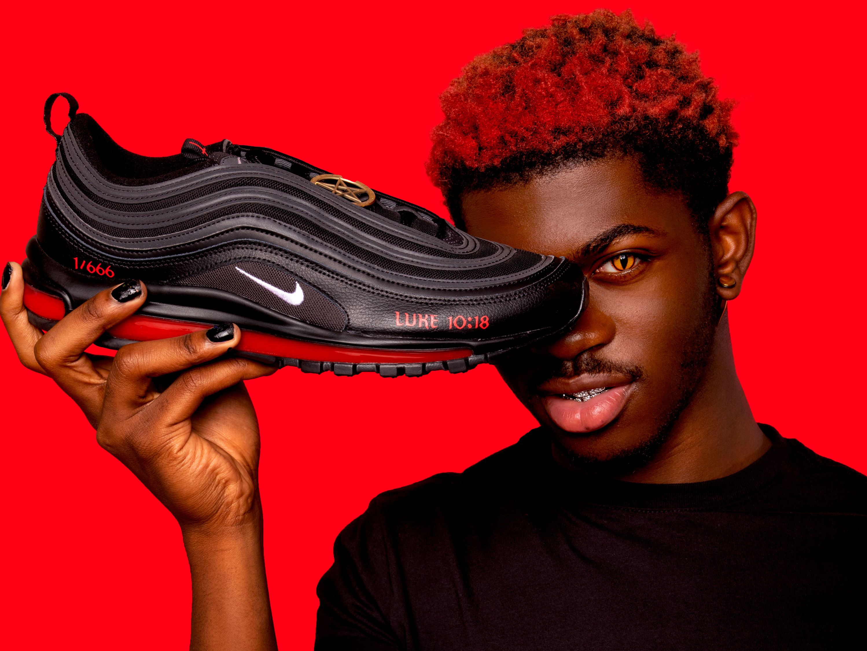 cualquier cosa gemelo Rusia Lil Nas X's unofficial 'Satan' Nikes containing human blood sell out in  under a minute | CNN