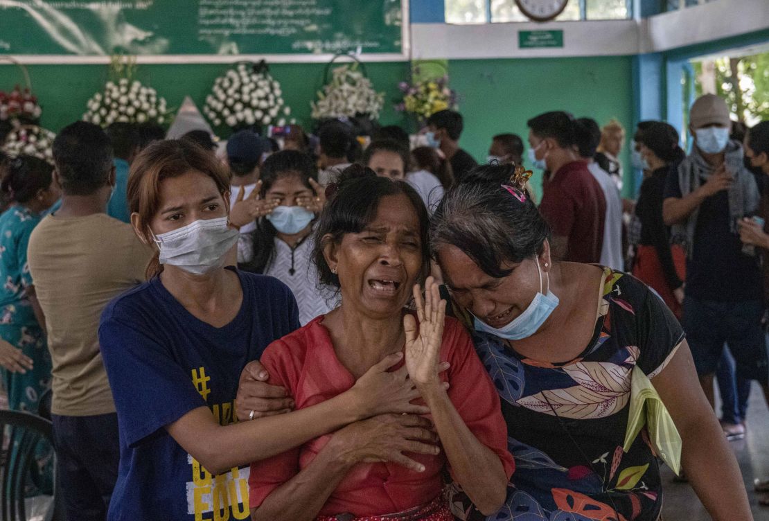 Family members and relatives attend the funeral ceremony of 13 year-old Sai Wai Yan, who was shot dead while playing outside his house in Yangon, Myanmar on March 28.