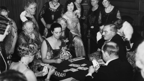 Four people, pictured here on November 29, 1930, playing Bridge.