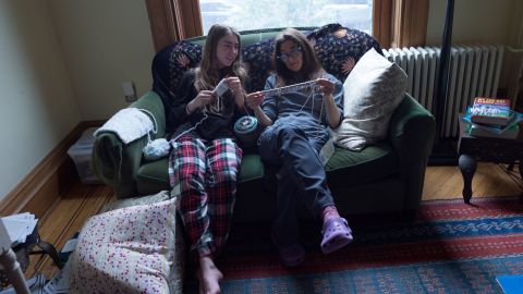 A mother and daughter learn to knit together in March 2020 in Brooklyn, New York. Some experts say the current surge of hobbies mirrors what happened during the Great Depression.