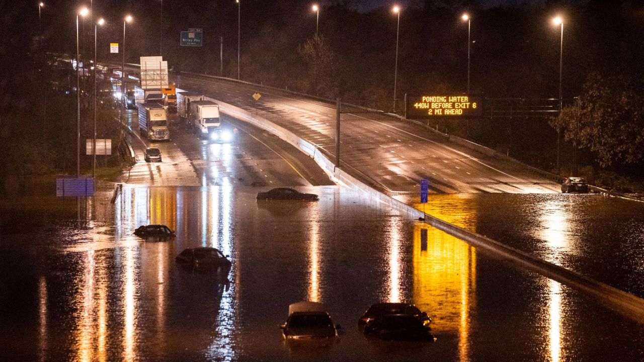 Cars are submerged by ponding water on Interstate 24 near Antioch Pike in Nashville on Sunday, March 28.
