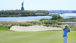 JERSEY CITY, NEW JERSEY - AUGUST 10:  Collin Morikawa of the United States plays a shot on the 18th hole during the third round of The Northern Trust at Liberty National Golf Club on August 10, 2019 in Jersey City, New Jersey. (Photo by Cliff Hawkins/Getty Images)