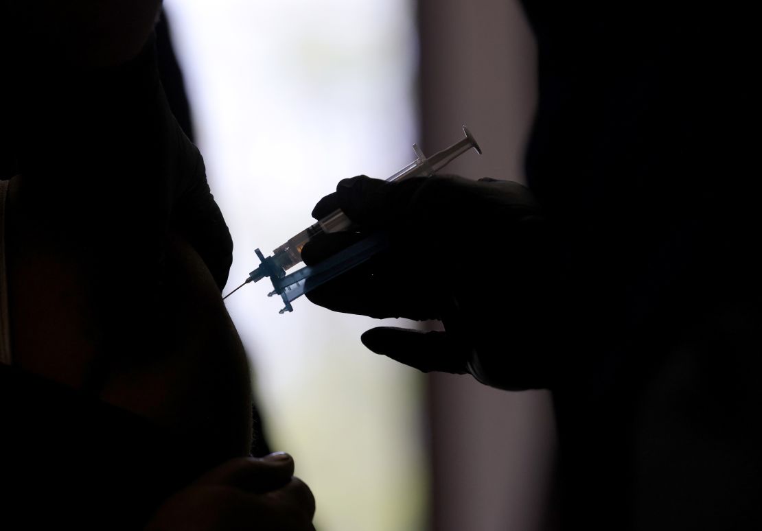 Pictured is a Maryland resident receiving the Moderna Covid-19 vaccine at a vaccination clinic on March 23. Structural racism is a concern that keeps some people of color from getting vaccinated during the pandemic.