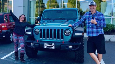 Turo renter Ryan Costello of Hawaii, and Tabitha Stoner, his fiance, with one of the 10 Jeeps that he now rents out. 