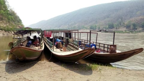 Boats of ethnic Karen villagers fleeing from air attacks by Myanmar military, are seen after crossing the Thai-Myanmar border in Mae Hong Son province, Thailand on March 28. 