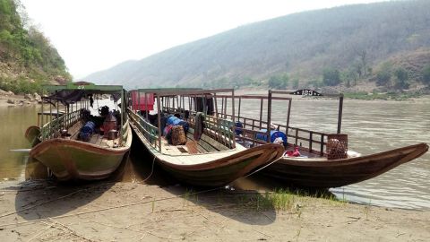 Boats of ethnic Karen villagers fleeing from air attacks by Myanmar military, are seen after crossing the Thai-Myanmar border in Mae Hong Son province, Thailand on March 28.