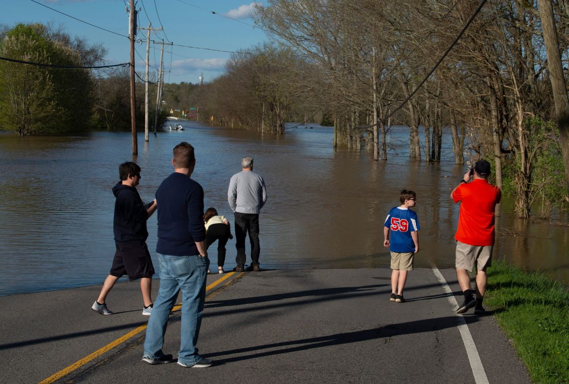 Bellevue residents survey flooding from the Harpeth River Sunday.