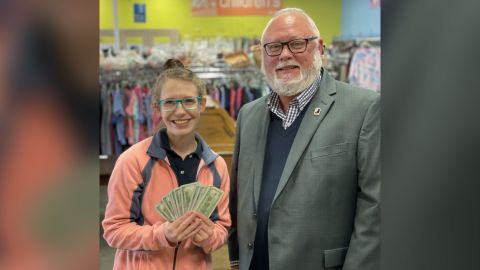 Frank Holland, the Goodwill VP of Donated Goods, presented Lessing with the cash reward.