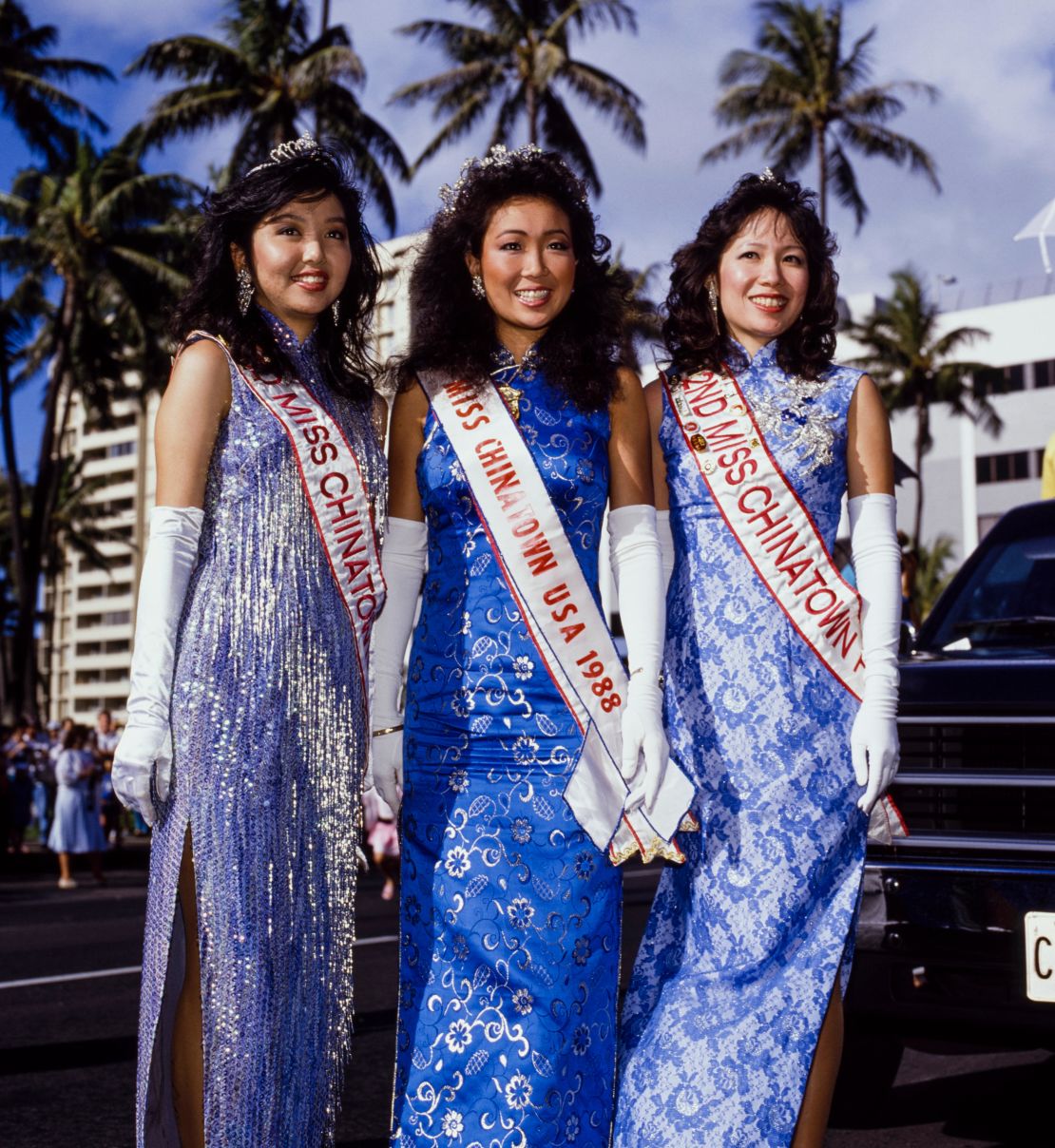Competitors of the 1988 Miss Chinatown USA pageant pose for cameras in Oahu, Hawaii.