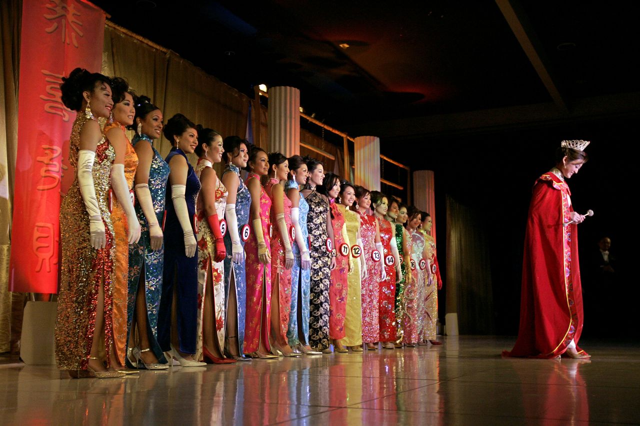 A rainbow of cheongsams are worn at the 2006 Miss Chinatown pageant in Los Angeles.