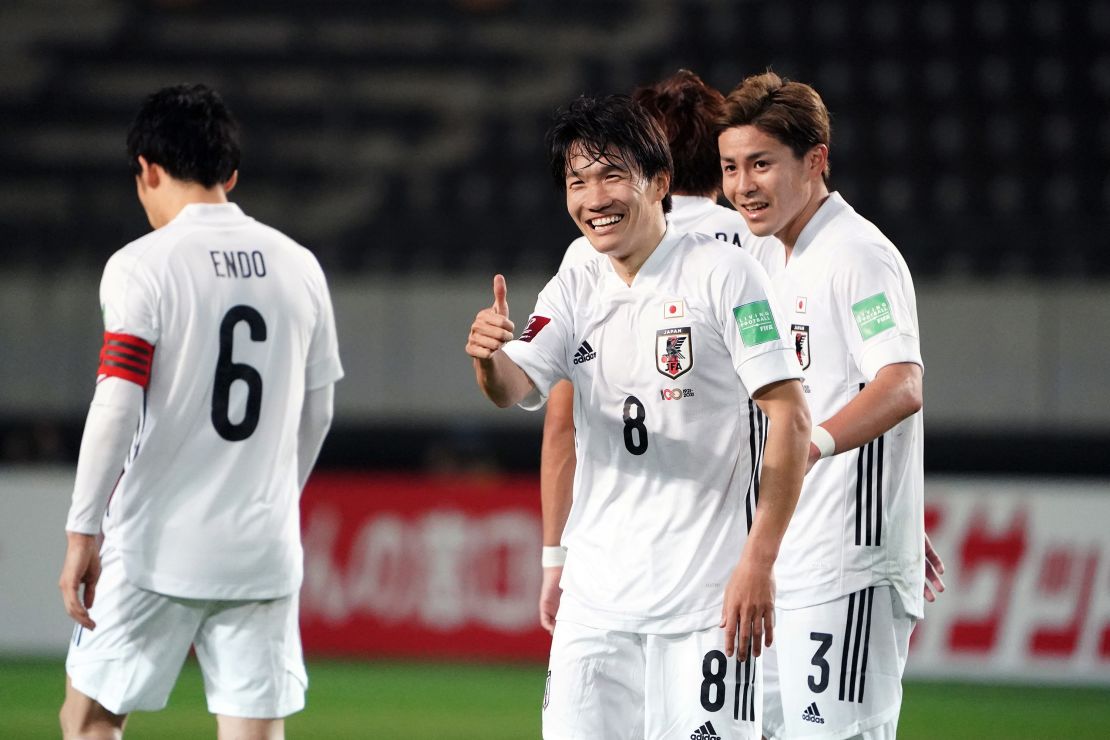 Sho Inagaki celebrates scoring his side's 14th goal against Mongolia.