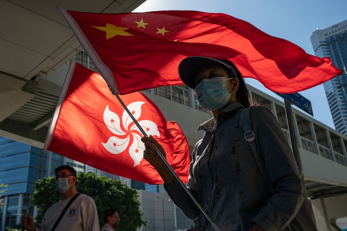Pro-Beijing supporters gather outside Hong Kong's Legislative Council on November 12, 2020.