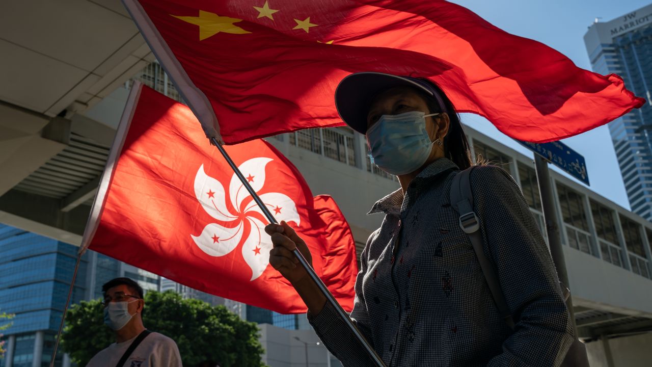 Pro-Beijing supporters gather outside Hong Kong's Legislative Council on November 12, 2020.