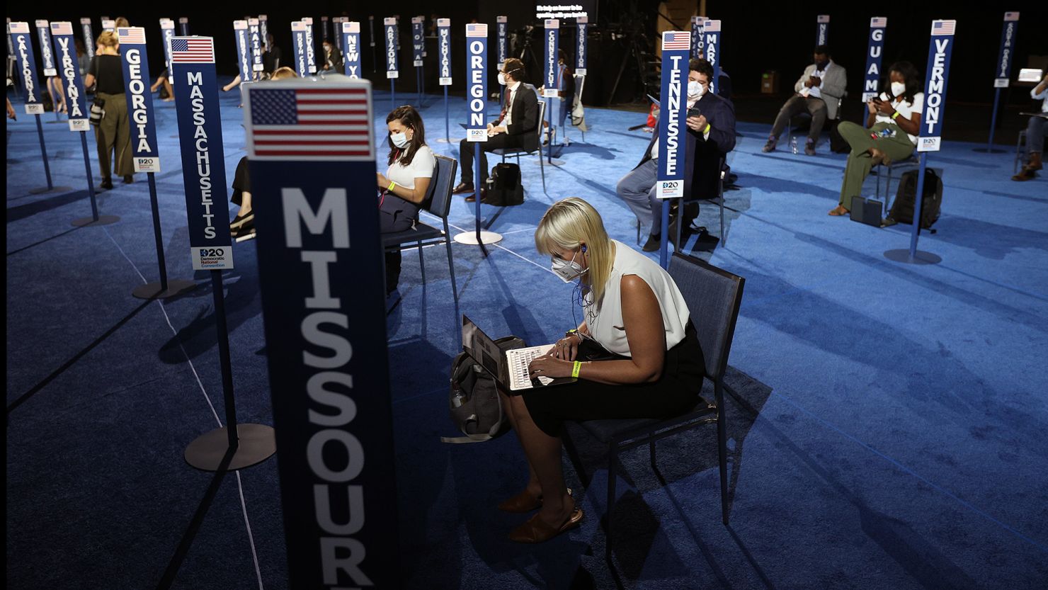 Members of the media wait for presumptive Democratic Vice Presidential nominee US Sen. Kamala Harris to speak on the third night of the Democratic National Convention from the Chase Center August 19, 2020 in Wilmington, Delaware.