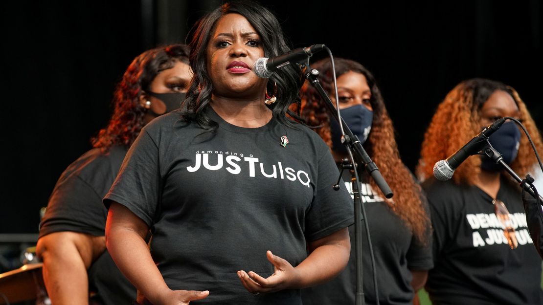 Tiffany Crutcher, the sister of Terence Crutcher, is pictured on stage with family members during events to mark Juneteenth.   