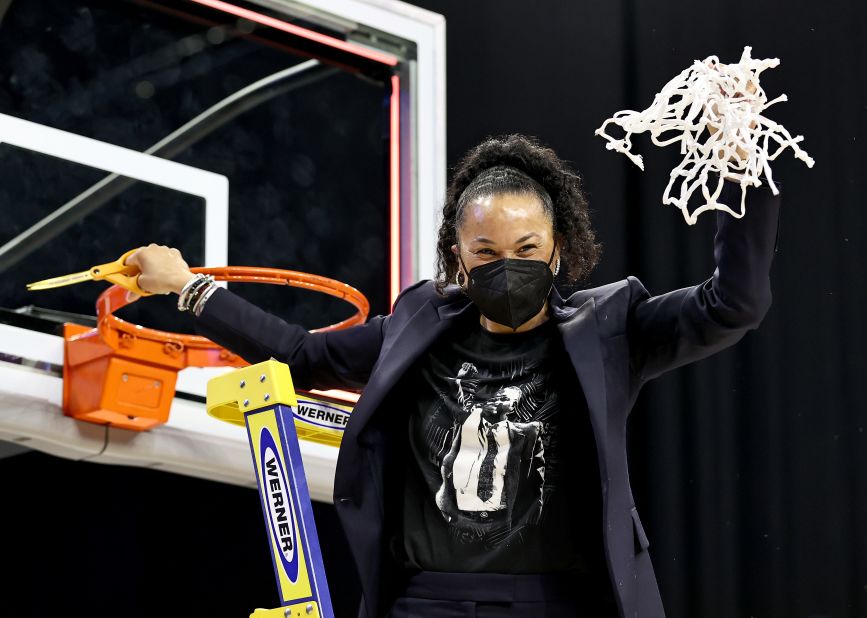 South Carolina head coach Dawn Staley cuts down the last piece of net after the Texas win. This was her third Final Four with the Gamecocks.