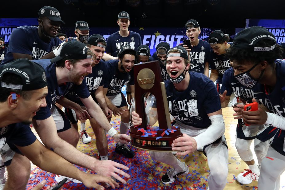 Gonzaga players celebrate after they won the West Regional on Tuesday, clinching a spot in the Final Four. The Bulldogs blew out USC 85-66.