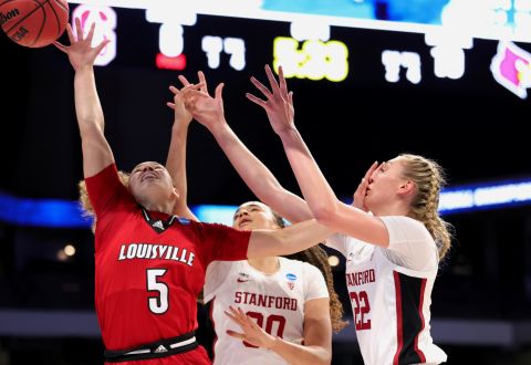 Louisville's Mykasa Robinson, left, fouls Stanford's Cameron Brink on Tuesday.