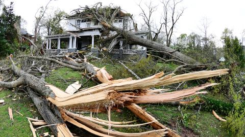 A tornado damaged a home in Historic Newnan, Georgia, on March 26, 2021.