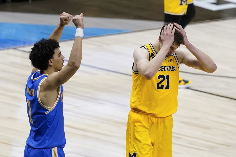 Michigan's Franz Wagner, right, reacts in front of UCLA's Jules Bernard after missing a shot at the end of the game on Tuesday.