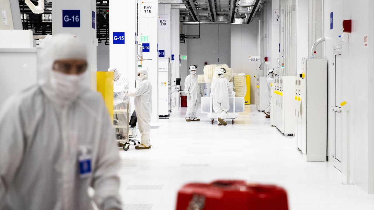 Employees work inside a semiconductor manufacturing facility in Malta, New York, on March 16, 2021. Production plants for semiconductors have become a focal point of economic recovery.