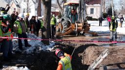 FLINT, MI - MARCH 4: City of Flint, Michigan workers prepare to replace a lead water service line pipe at the site of the first Flint home with high lead levels to have its lead service line replaced under the Mayor's Fast Start program on March 4, 2016 in Flint, Michigan. The program aims to replace all the lead water pipes in the city and will target homes in neighborhoods with the highest number of children under 6 years old, senior citizens, pregnant women and other high risk homes first.  (Photo by Bill Pugliano/Getty Images)