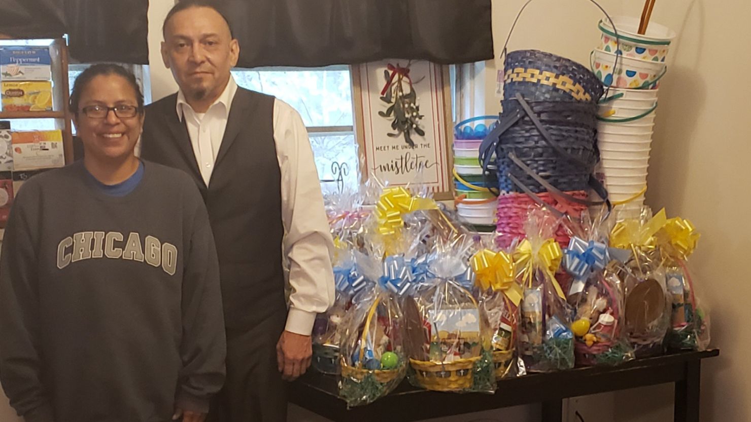 Brian Mask and Sandy Steve with donated Easter baskets they will distribute to children in their tribe affected by the pandemic. A food drive organized last June in a former Dollar General store was overwhelmingly successful.
