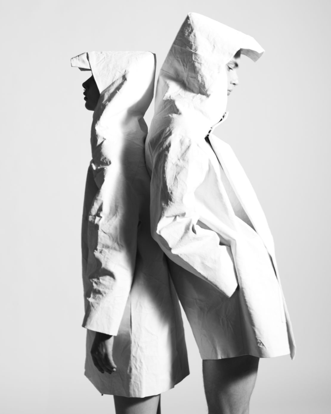A pair of canvas coats designed by the Toogood sisters for their debut collection in 2013. 