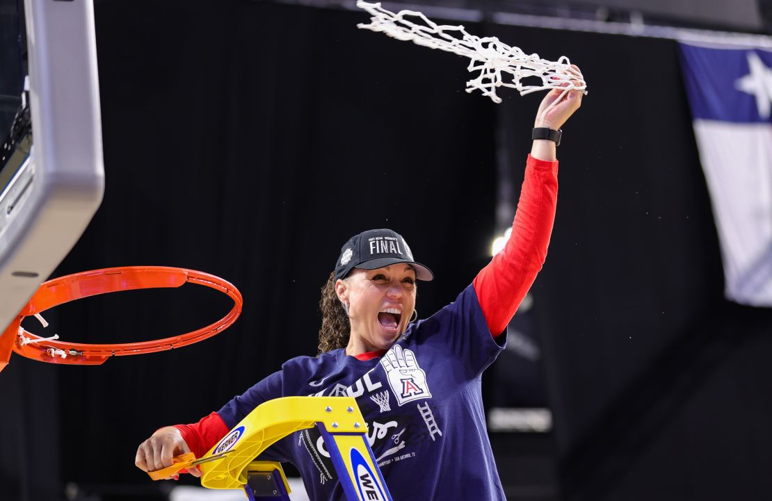 Arizona Wildcats head coach Adia Barnes of the Arizona Wildcats cuts the net after defeating the Indiana Hoosiers in the Elite Eight round of the NCAA Women's Basketball Tournamen.