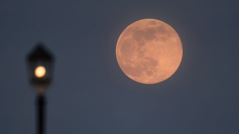 A pink supermoon rises on April 07, 2020 in Worthing, United Kingdom. 