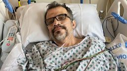 Ramirez in hospital bed at St. Charles Hospital 