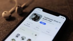 Clubhouse Drop-in audio chat app logo on the App Store is seen displayed on a phone screen in this illustration photo taken in Poland on February 21, 2021.  (Photo illustration by Jakub Porzycki/NurPhoto via Getty Images)