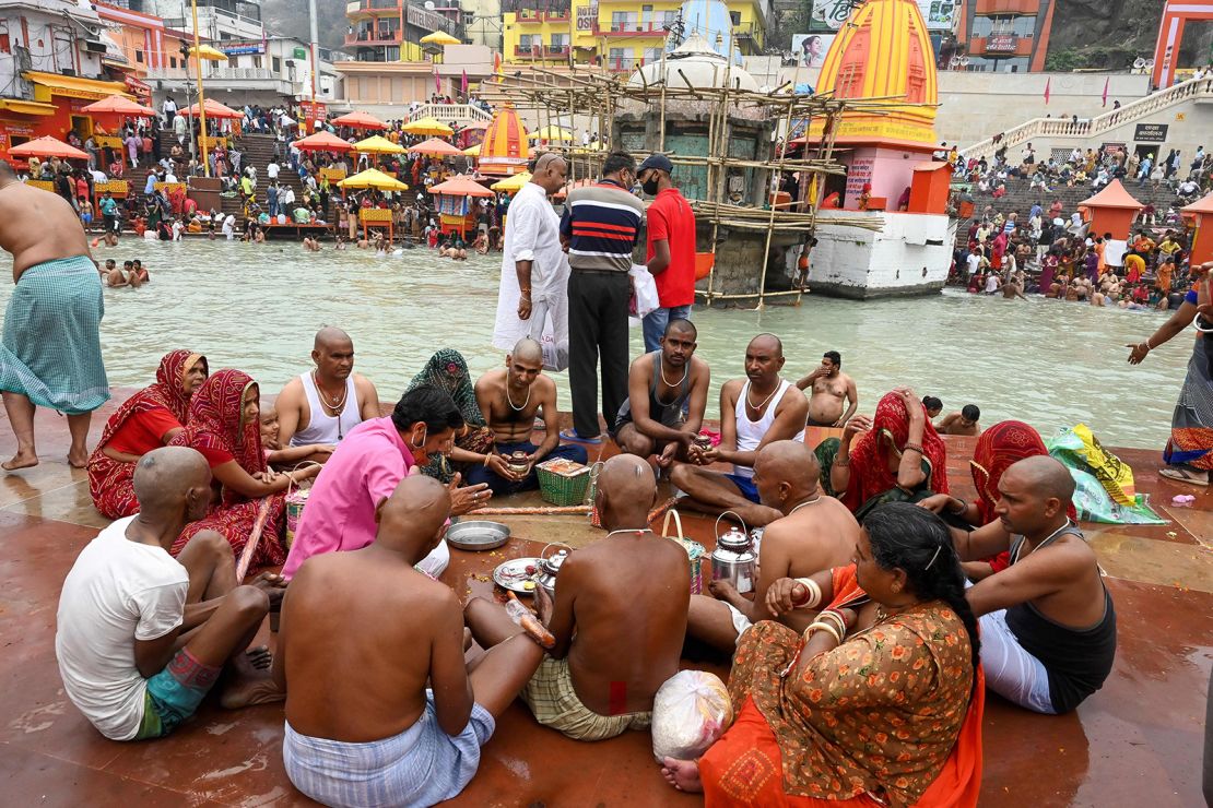 Hindus perform a religious ritual on the banks of Ganges River during the Kumbh Mela festival in Haridwar, India, on March 12.