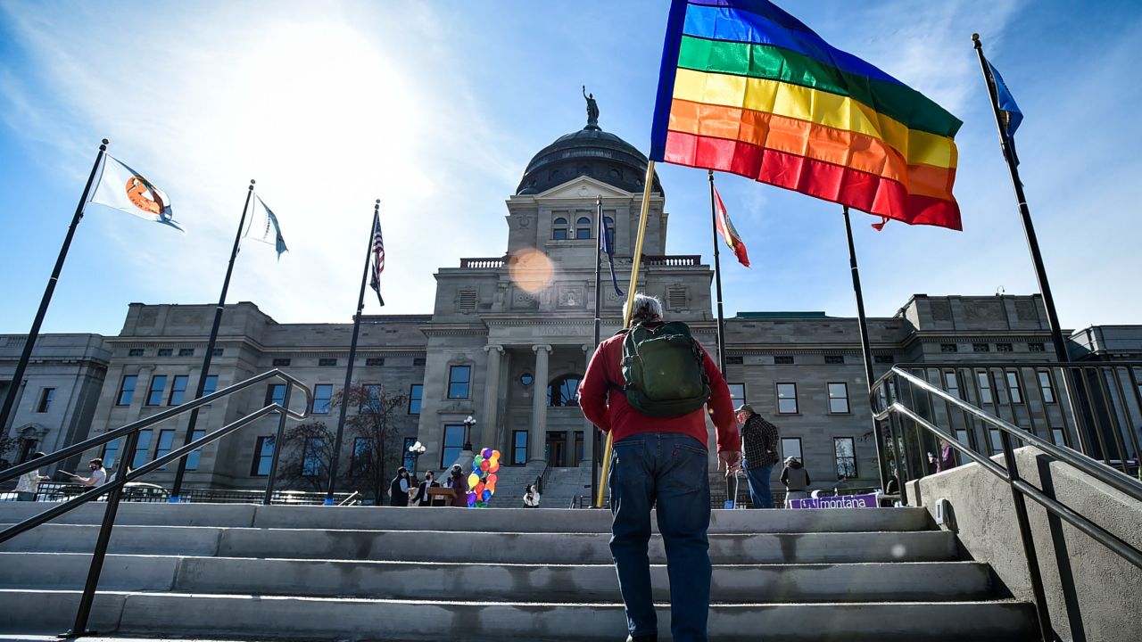 Demonstrators gather outside the Montana State Capitol in March to protest two bills that would target transgender youth.
