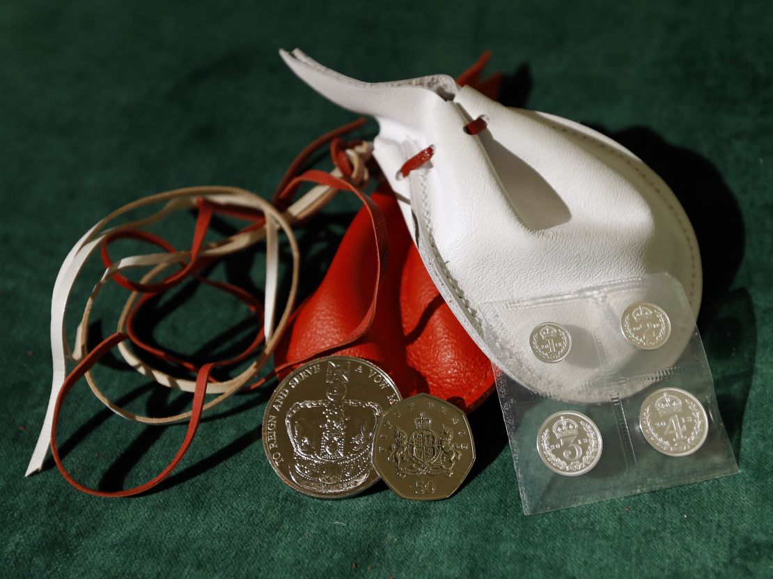 Examples of the two purses that the Queen distributed during the Royal Maundy Service in 2013. 
