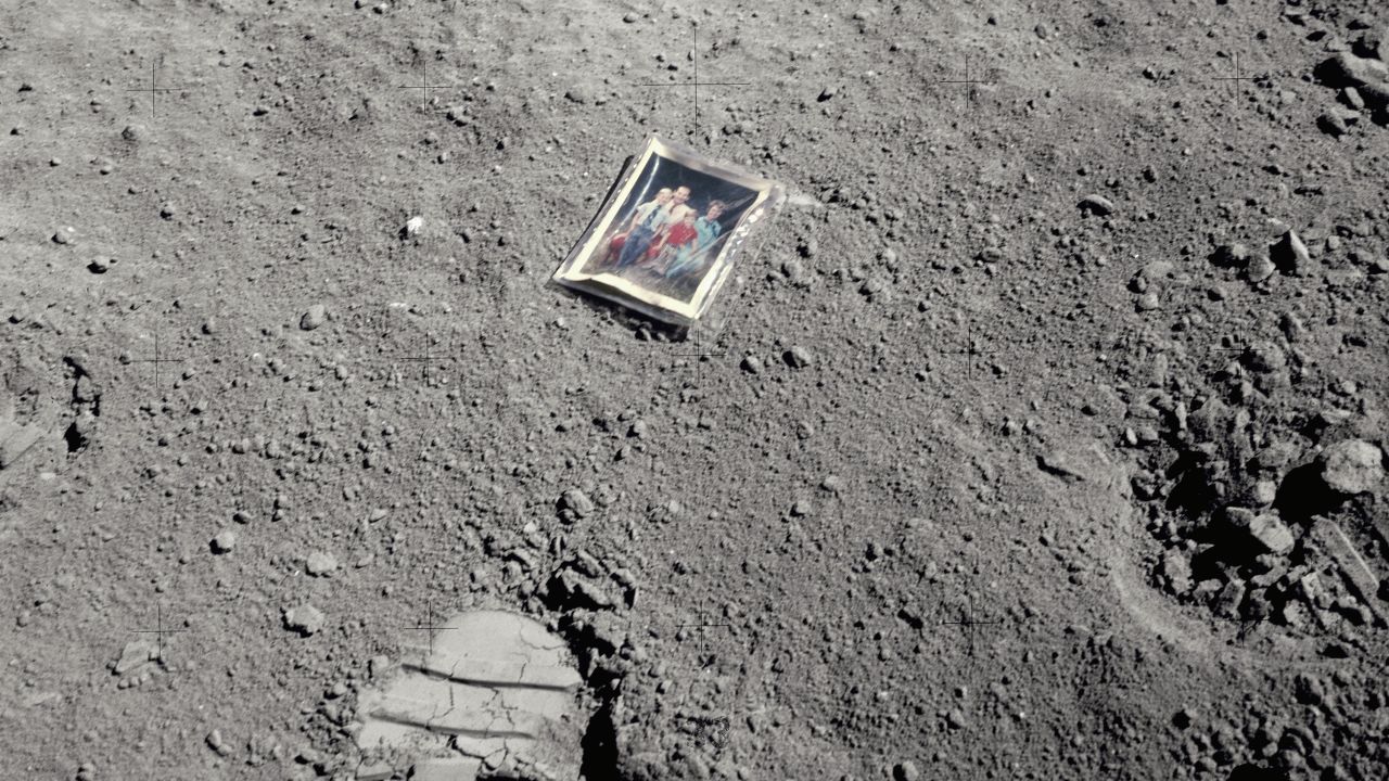 This is a family photo left behind by one of the Apollo 16 astronauts at Descartes Crater on the surface of the moon.
