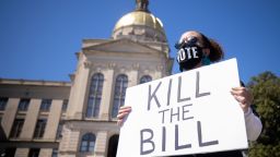 Opponents of HB 531 & SB 241, Republican backed bills accused of purporting voter suppression, hold a protest outside the Georgia state capitol building on March 8, 2021 in Atlanta, Georgia.