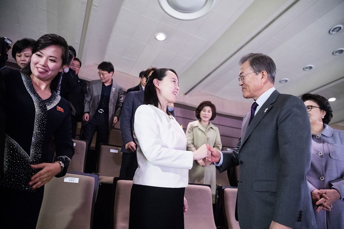 South Korean President Moon Jae-in (right) shakes hands with Kim Yo-Jong (middle), North Korean leader Kim Jong-Un's sister.