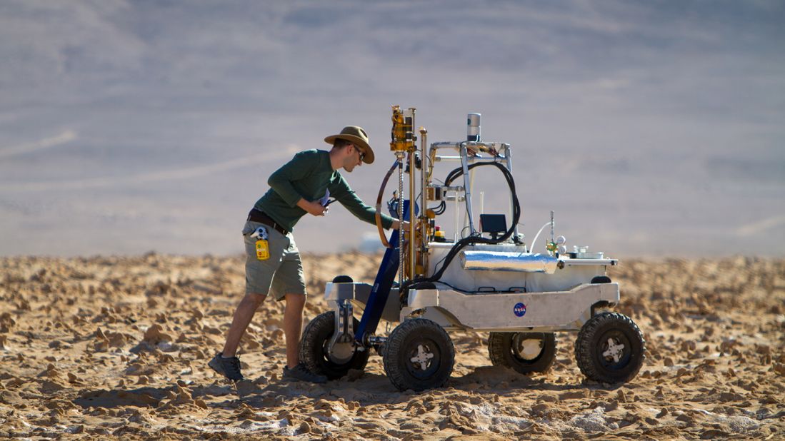<strong>Field tests: </strong>Engineer Dean Bergman works on NASA's ARADS rover during field tests in 2018. The rover can navigate and drive independently, even over steep or uneven ground. 
