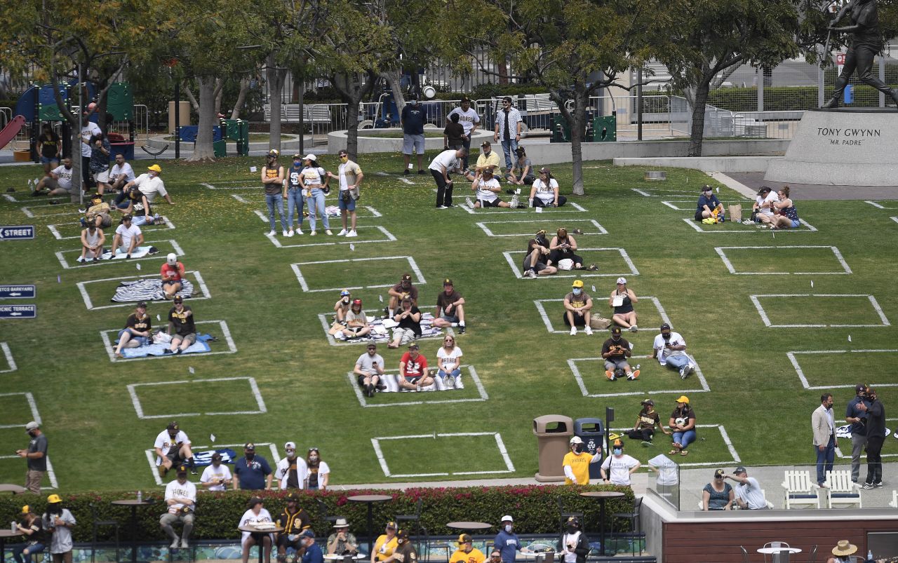 Fans sit in socially distanced squares during a game in San Diego.