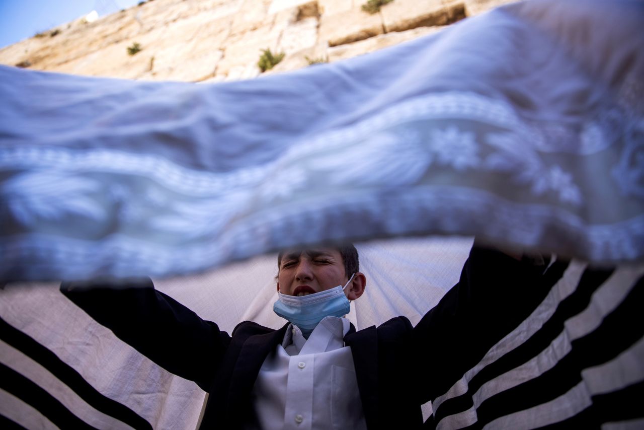 A boy prays during a Passover blessing at the Western Wall in Jerusalem on Monday, March 29.
