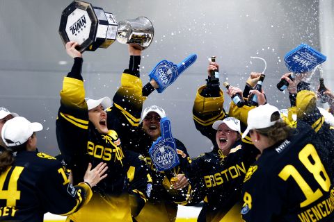 Kaleigh Fratkin lifts the Isobel Cup after the Boston Pride defeated Minnesota to with the National Women's Hockey League title on Saturday, March 27. 