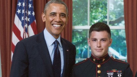 President Obama poses with Trevor Reed in an undated White House photo.