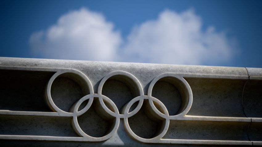 A picture taken on March 8, 2021 in Lausanne shows the Olympic rings next to the headquarters of the International Olympic Committee (IOC) ahead of a session of the World's sport governing body held virtually. (Photo by Fabrice COFFRINI / AFP) (Photo by FABRICE COFFRINI/AFP via Getty Images)