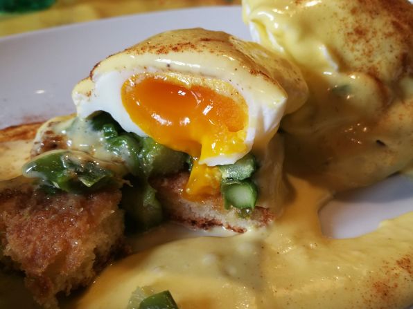 This elegant eggs Benedict features tender asparagus, poached eggs and creamy hollandaise.